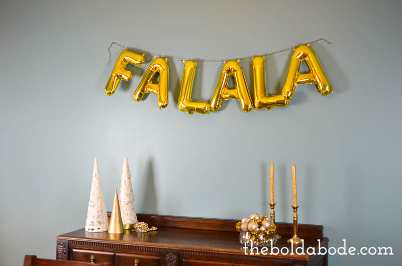 Add a little whimsey to your Holidays with this fun FALALA Banner. It's so easy to put together and makes the entire room sparkle!