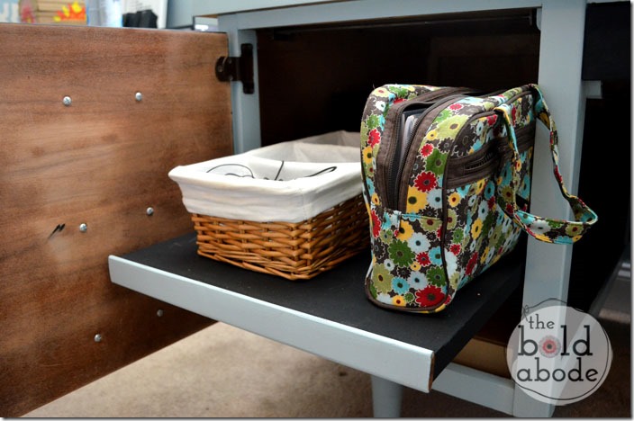 Slide out shelf that pops up