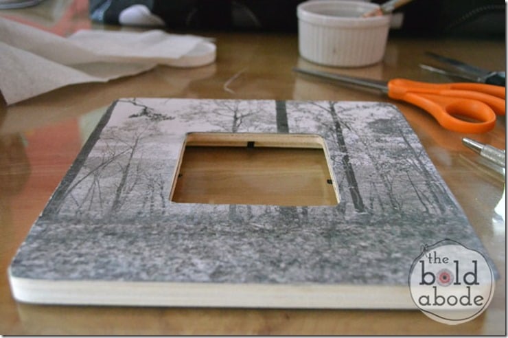 Mod Podge the paper onto the frame