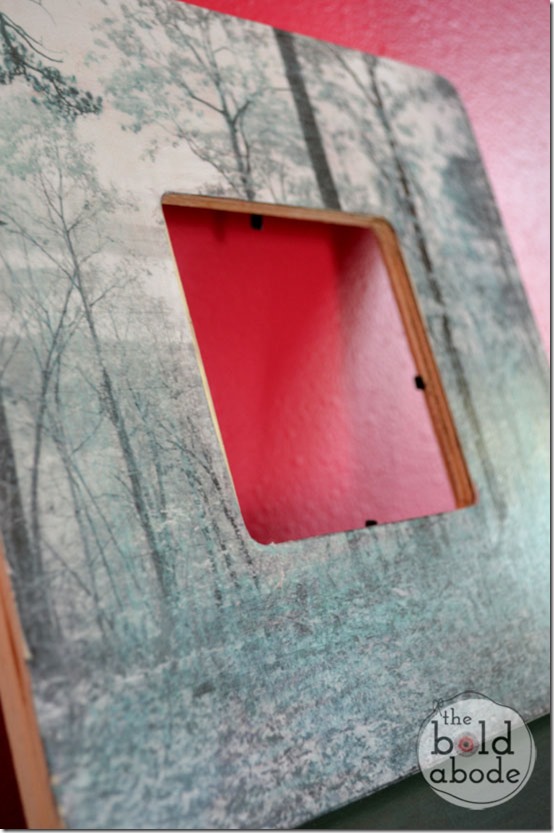 Picture frame with bottom layer scene